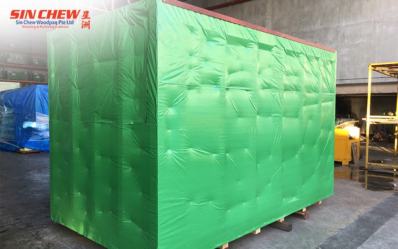 Forklift transporting wooden shipping crates